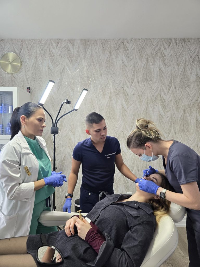 Sonya Feskiv, RPN, supervising students during a hands-on injector training course in Vaughan